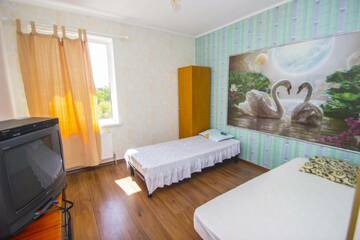 Фото номера Двухместный номер с 2 отдельными кроватями Гостевой дом Guest House Zhemchuzhnyy 1 г. Каролино-Бугаз 4